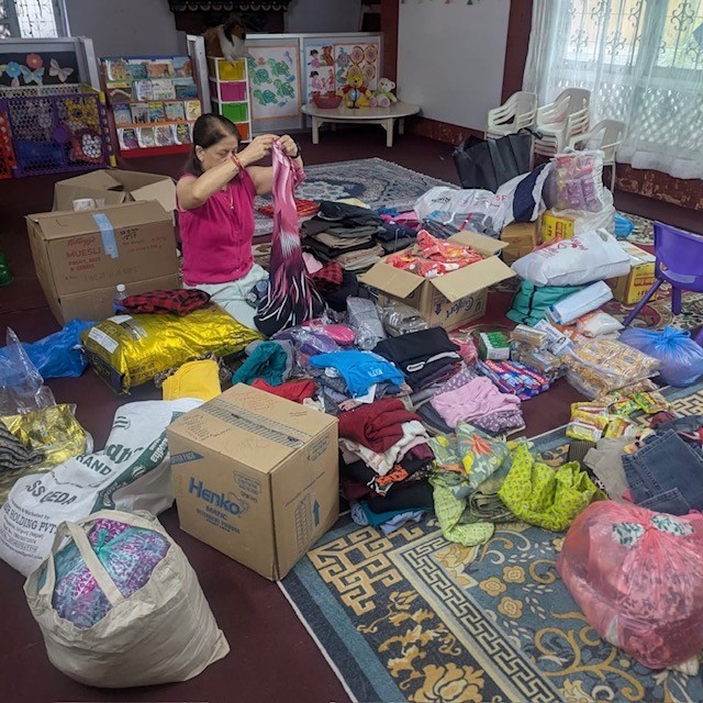 Humanity Himalaya volunteers collecting, packing and distributing relief supplies to people affected by disaster